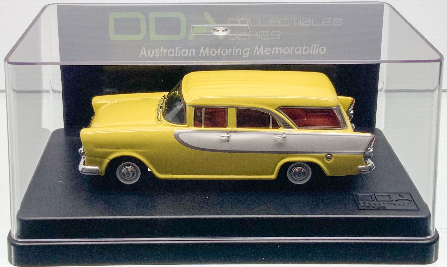 "Scale model of a Holden FB Station Wagon in Yellow/White by DDA Collectibles, scaled at 1:43. Shop now at tatoyshop.com for shipping to selected countries and within Australia."